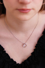 Sterling Silver Circle Pendant with Dangling Cubic Zirconia